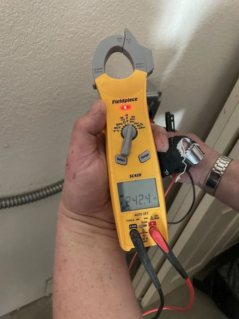 Voltage testing with clamp meter during Aluminum Wiring Replacement in Windham